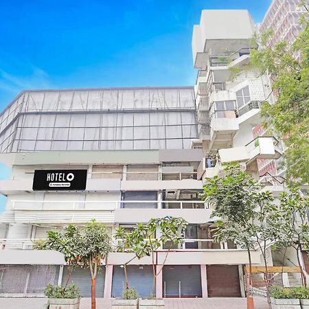 Super Hotel O Navrangpura Cg Road Formerly Hotel Yugraj Ахмедабад Екстериор снимка